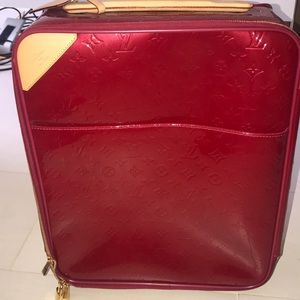 Red Louis Vuitton Rolling Carry on Luggage